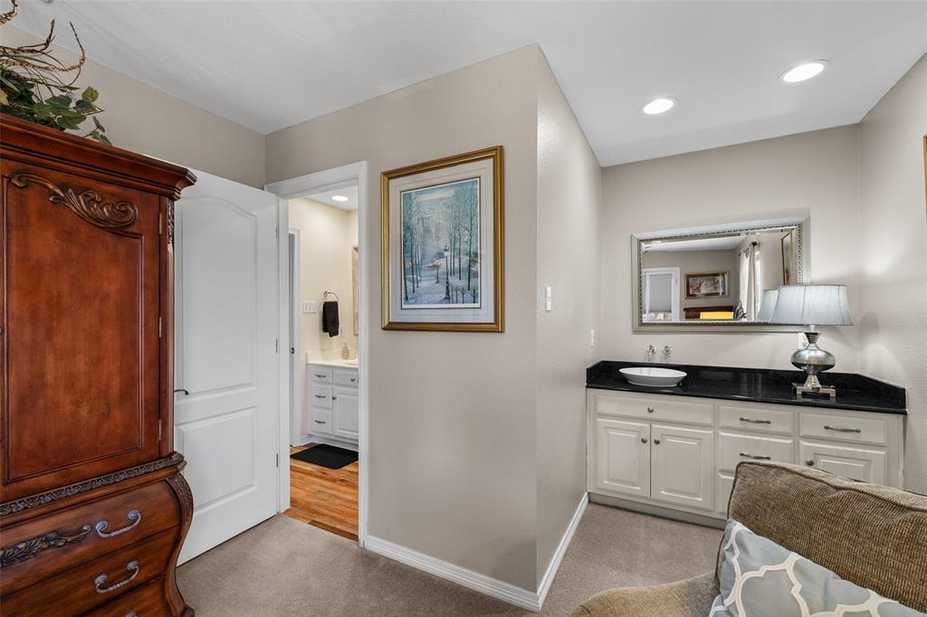8903 Ravenswood Road Granbury, TX 76049 - Photo 25 of 36 Built In Vanity In Third Bedroom With Granite Counter