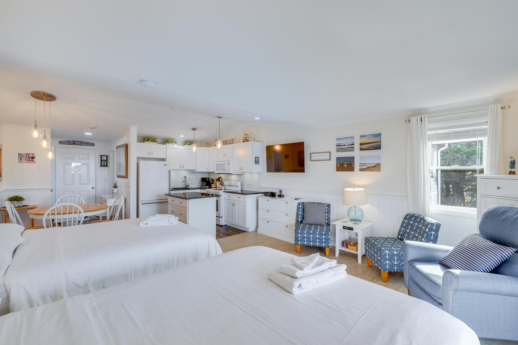 132 Shore Road, Unit 48 Truro, MA 02666 - Photo 1 of 35 a large white room with furniture