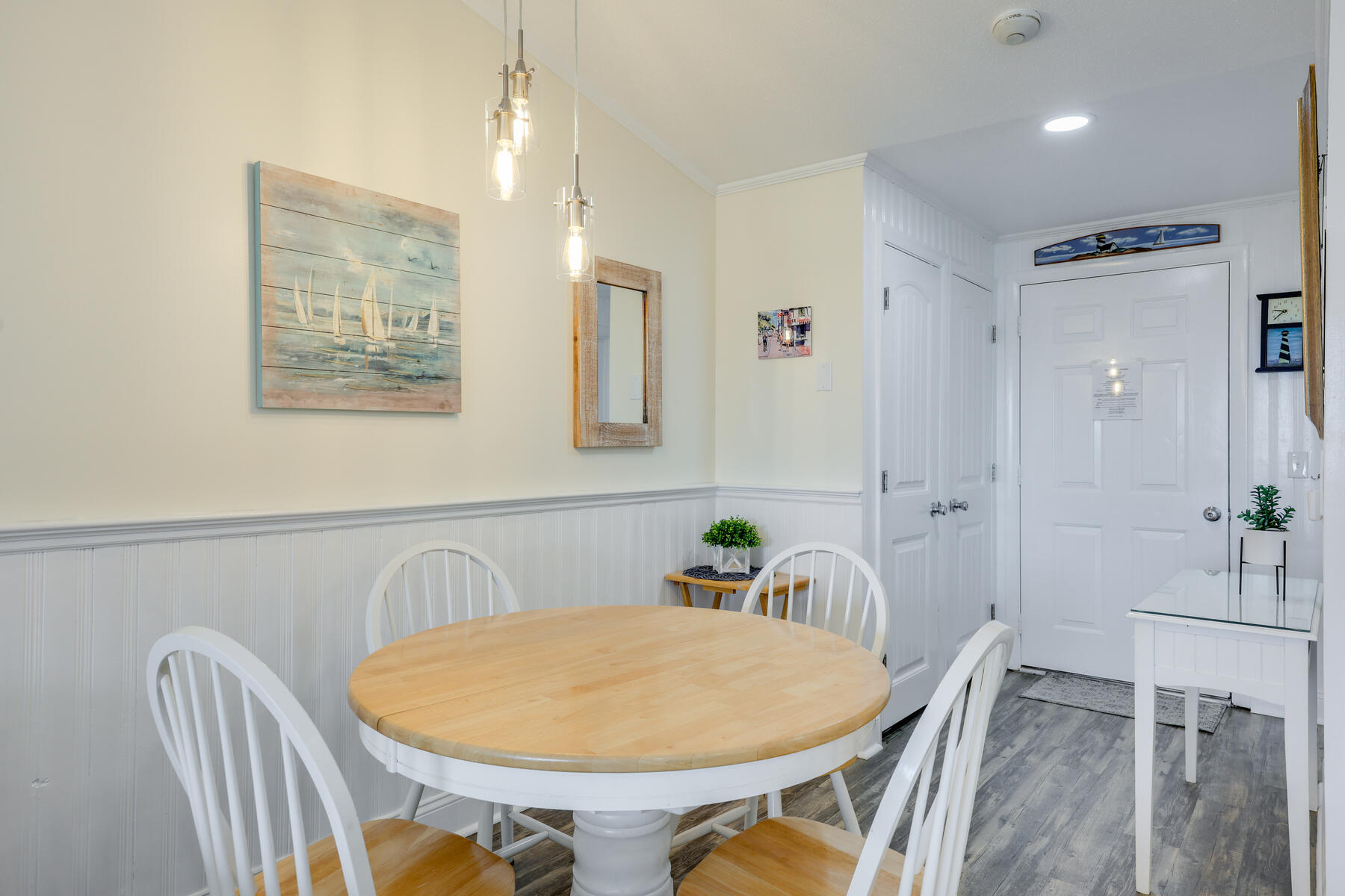 132 Shore Road, Unit 48 Truro, MA 02666 - Photo 12 of 35 a view of a dining room with furniture
