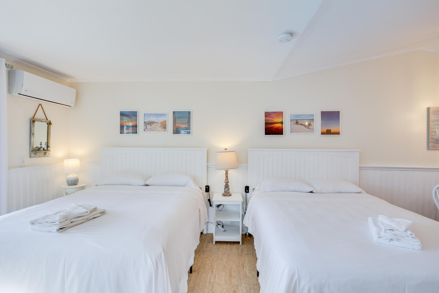 132 Shore Road, Unit 48 Truro, MA 02666 - Photo 17 of 35 a bedroom with a bed and a night stand