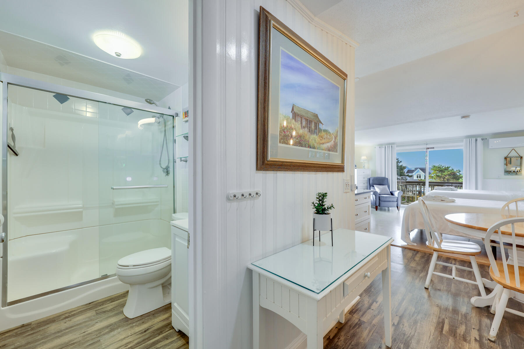132 Shore Road, Unit 48 Truro, MA 02666 - Photo 21 of 35 a bathroom with a sink a toilet and shower