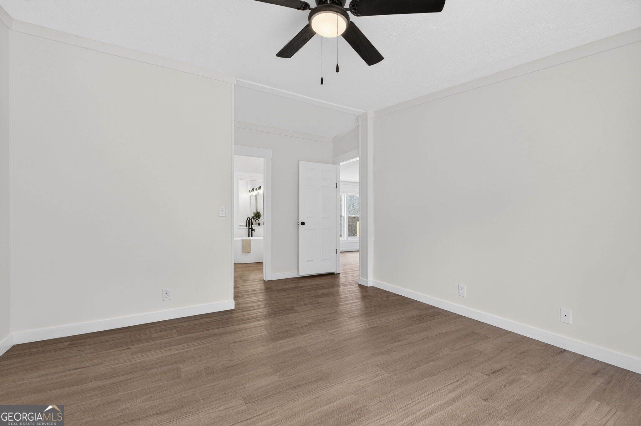 329 Brook Road Barnesville, GA 30204 - Photo 23 of 37 a view of an empty room with wooden floor