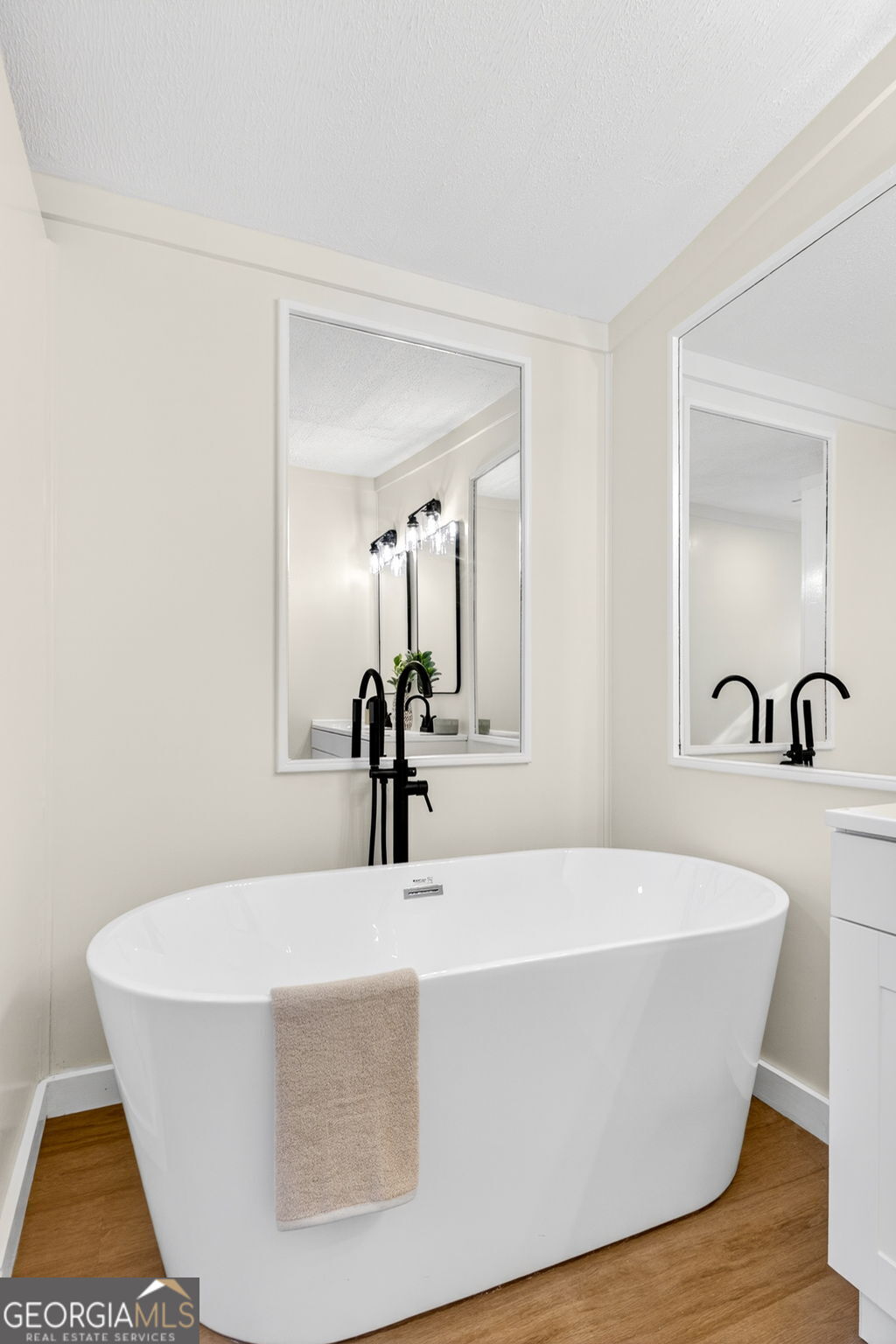 329 Brook Road Barnesville, GA 30204 - Photo 25 of 37 a white bath tub sitting in a bathroom