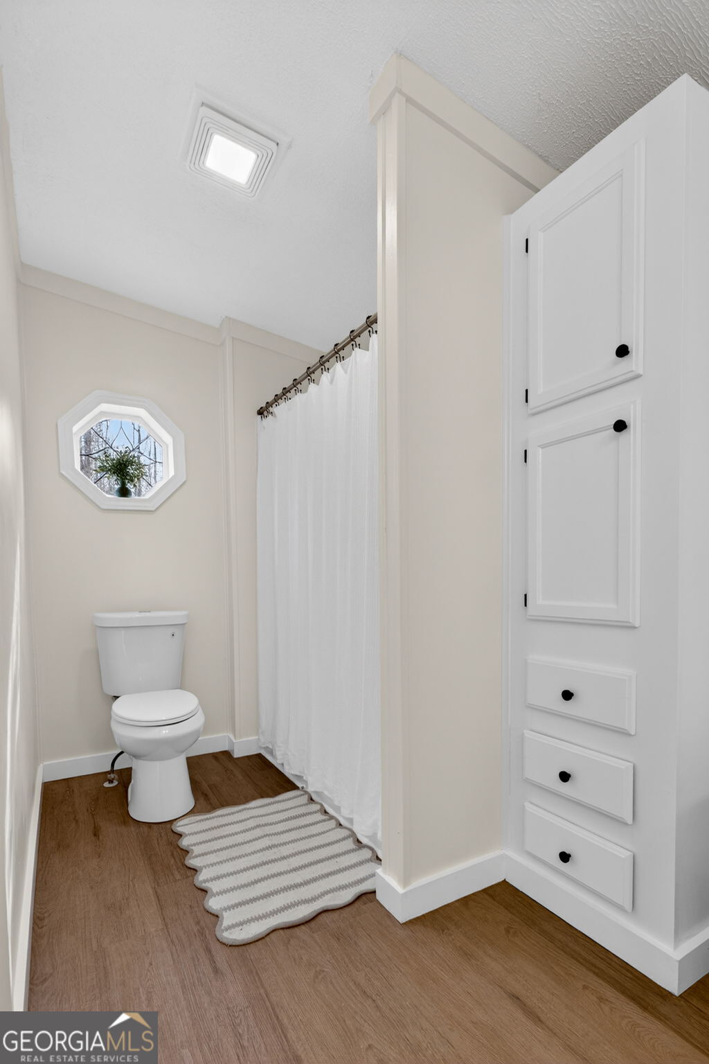 329 Brook Road Barnesville, GA 30204 - Photo 27 of 37 a bathroom with a toilet and a shower