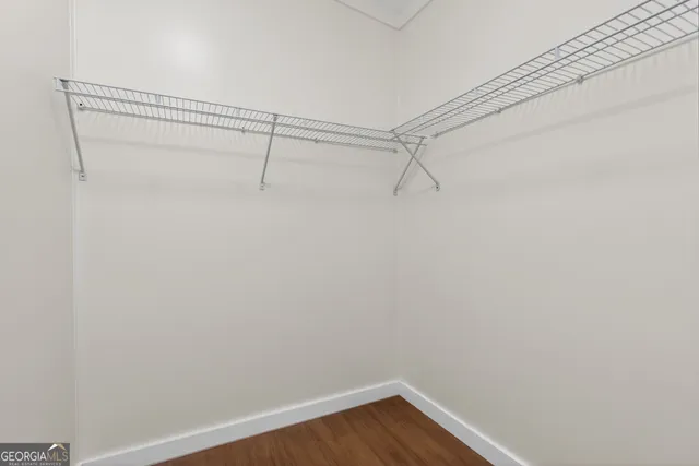 a view of a room with racks on the wall