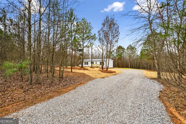 a view of road with trees