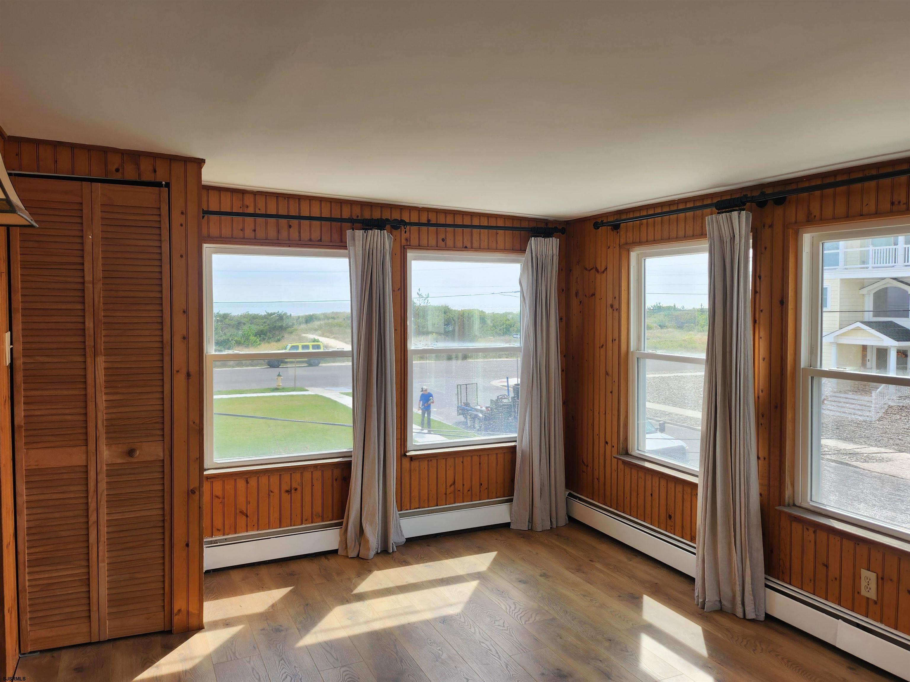 353 11th Street South, Unit 2 Brigantine, NJ 08203 - Photo 7 of 17 a view of an empty room and window
