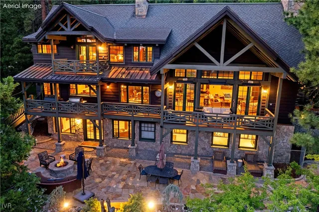 a front view of a residential apartment building with a yard