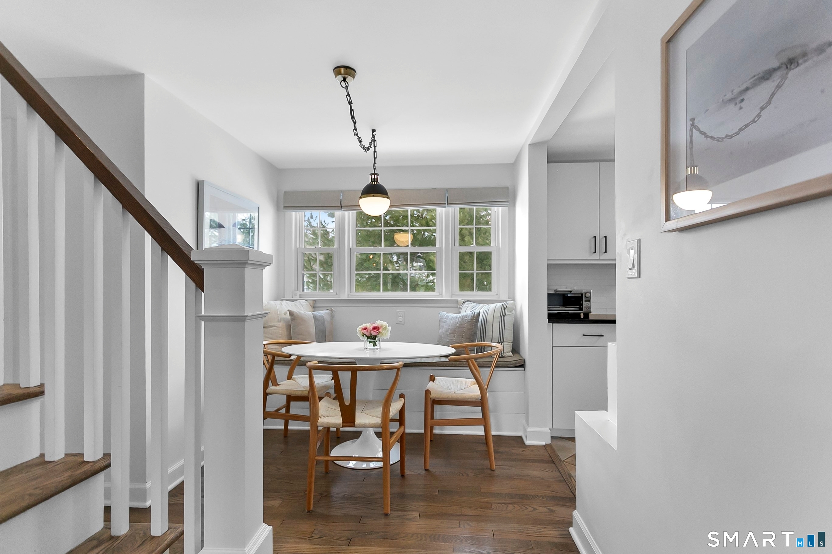 121 Alden Street Fairfield, CT 06824 - Photo 15 of 29 a view of a dining room with furniture window and wooden floor