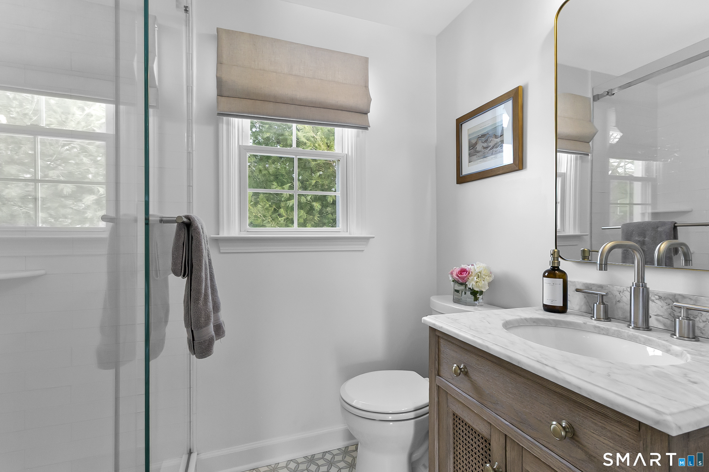 121 Alden Street Fairfield, CT 06824 - Photo 16 of 29 a bathroom with a granite countertop sink toilet and shower