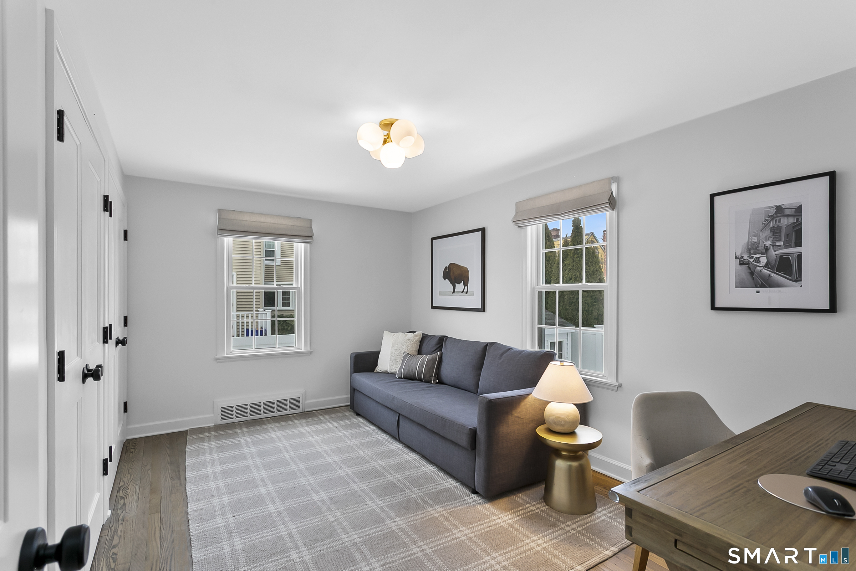 121 Alden Street Fairfield, CT 06824 - Photo 17 of 29 a living room with furniture and a window