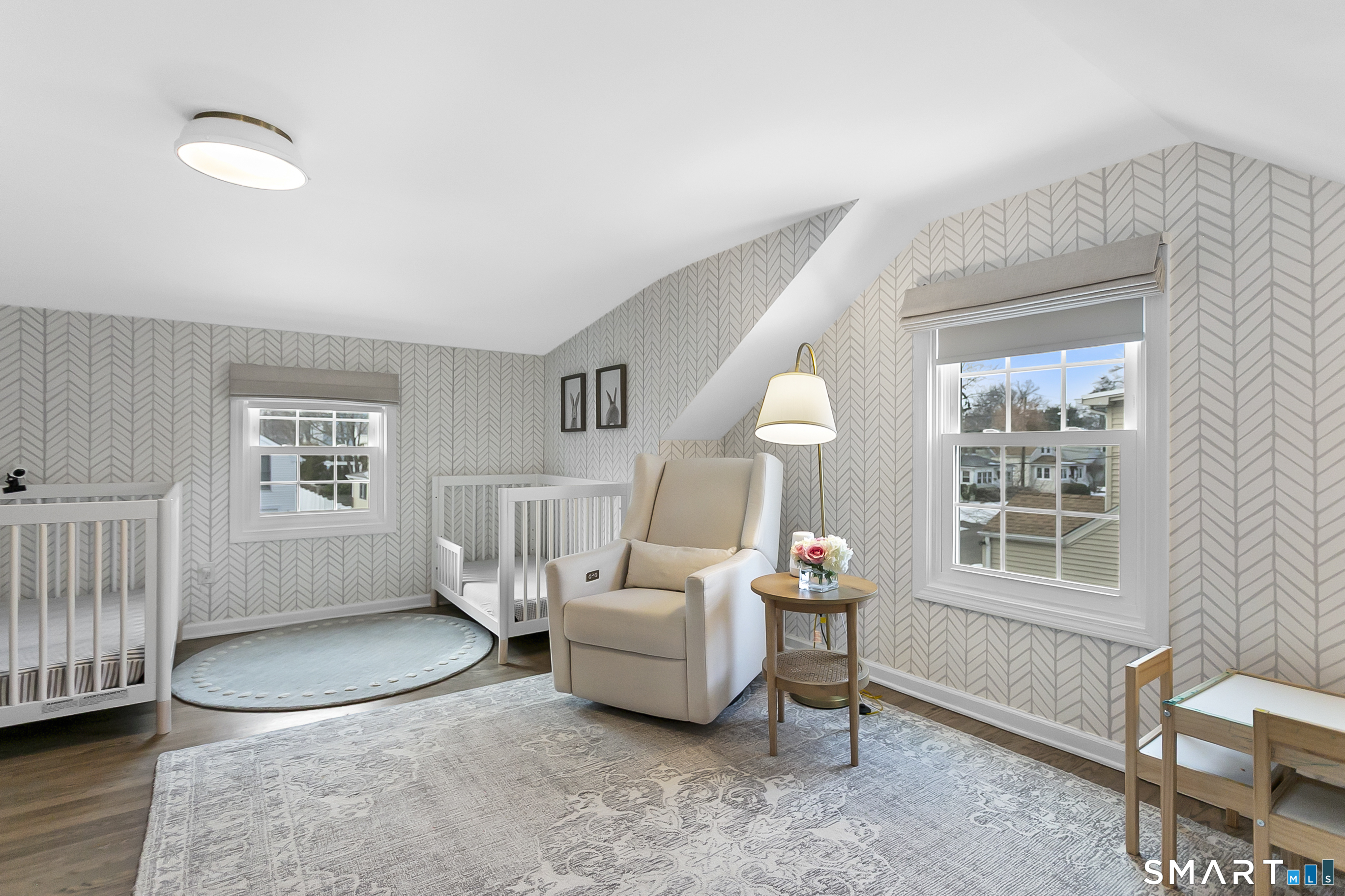 121 Alden Street Fairfield, CT 06824 - Photo 24 of 29 a living room with furniture and a window
