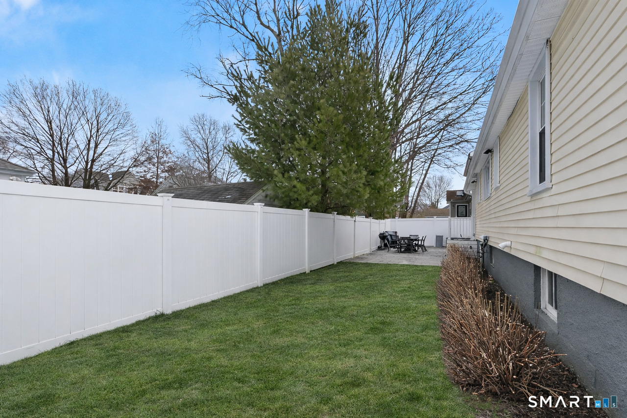 121 Alden Street Fairfield, CT 06824 - Photo 28 of 29 a view of a backyard