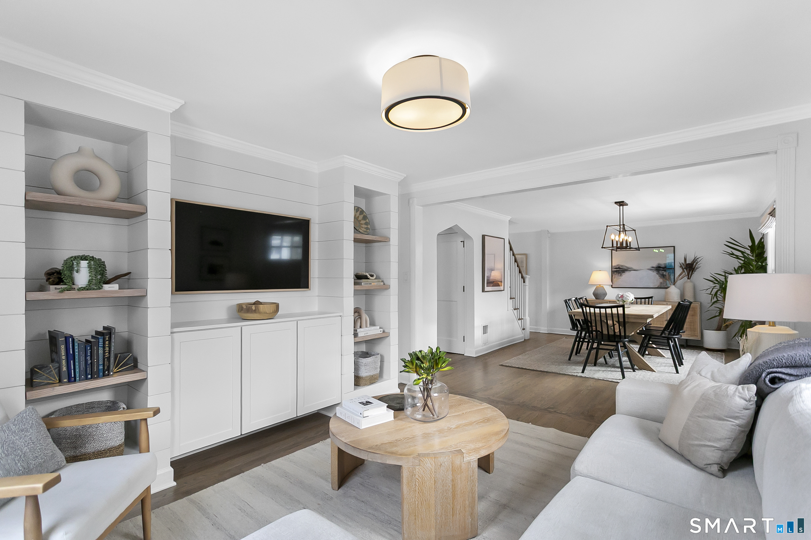 121 Alden Street Fairfield, CT 06824 - Photo 3 of 29 a living room with furniture and a flat screen tv