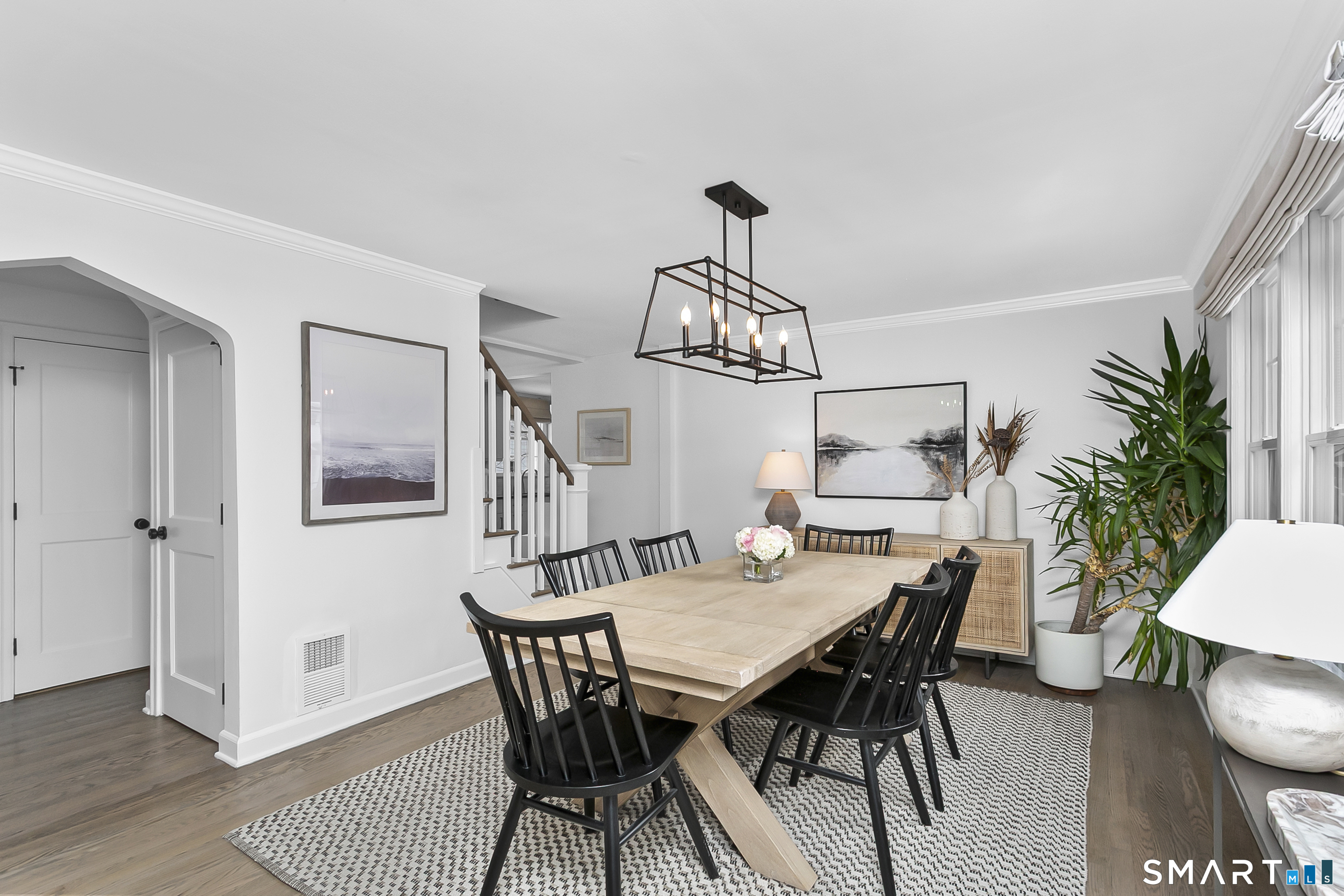 121 Alden Street Fairfield, CT 06824 - Photo 7 of 29 a view of a dining room with furniture and wooden floor