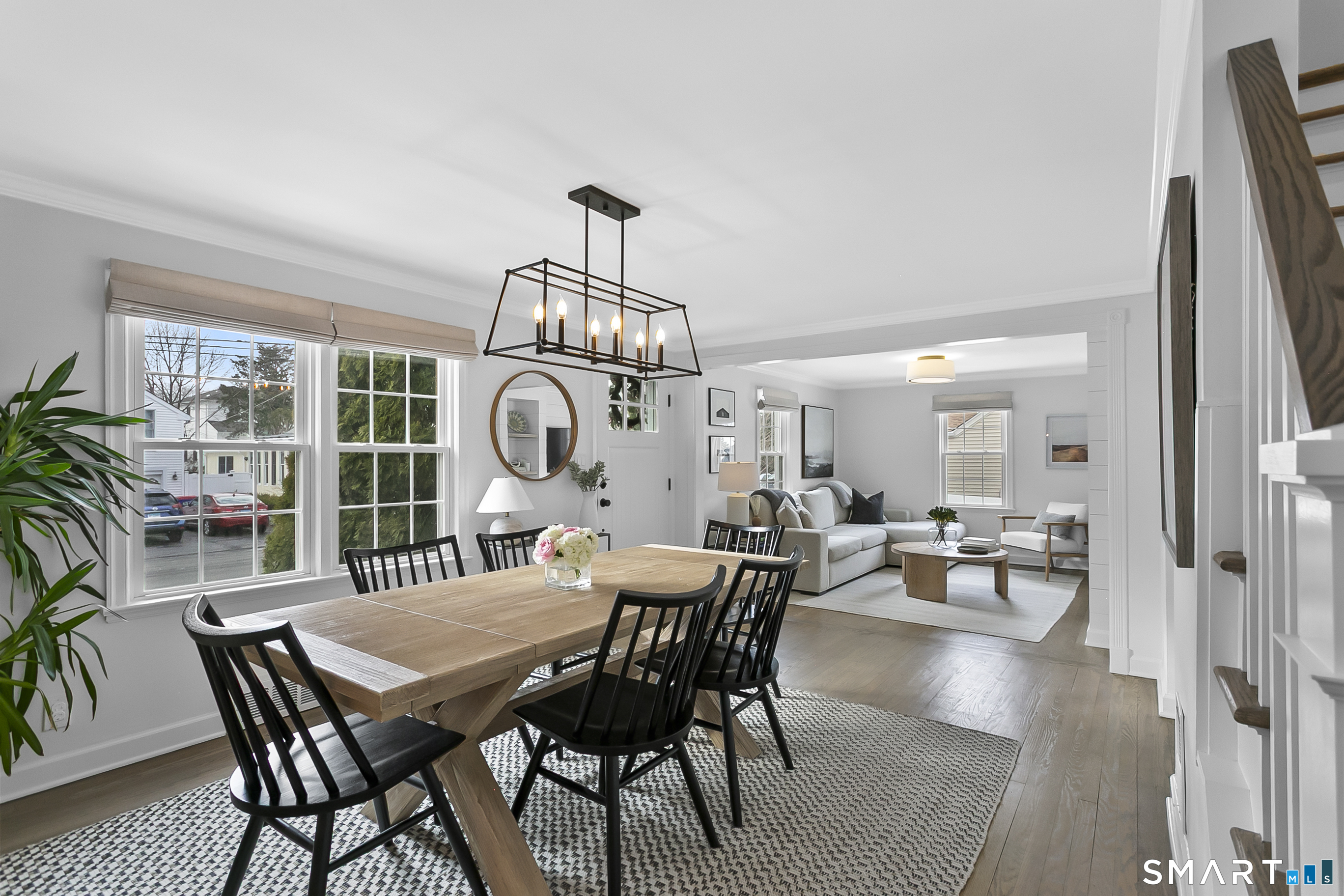 121 Alden Street Fairfield, CT 06824 - Photo 8 of 29 a view of a dining room with furniture window and wooden floor