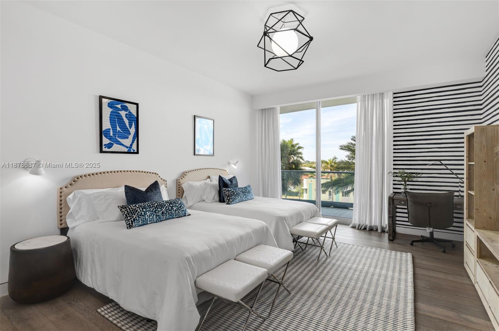 9349 Collins Avenue, Unit 406 Surfside, FL 33154 - Photo 21 of 48 a bedroom with a large bed and a window