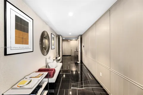 a room with furniture and a mirror