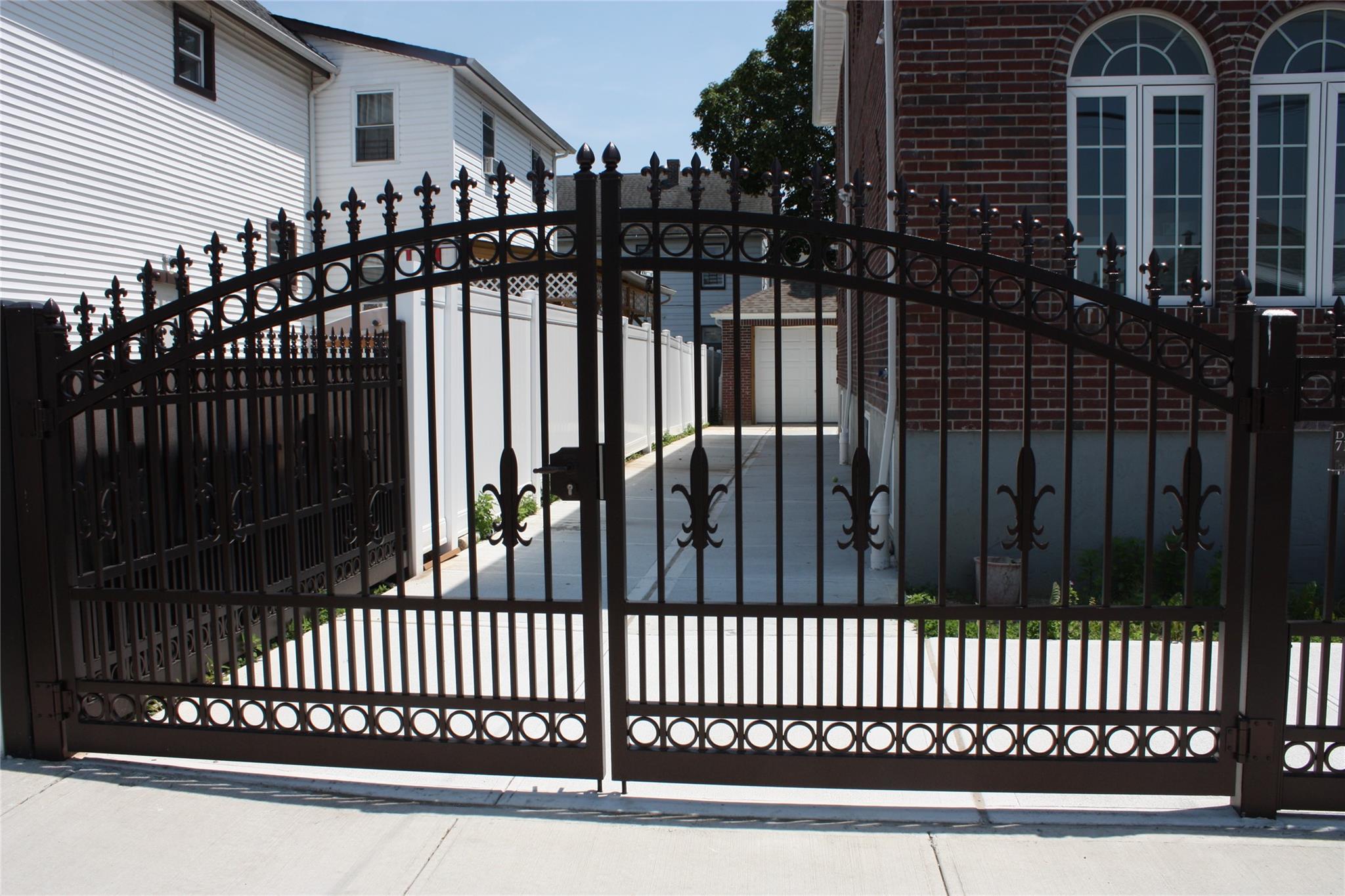 157-18 115th Road, Unit 2 FAMILY Queens, NY 11434 - Photo 18 of 36 a view of a balcony with wooden fence