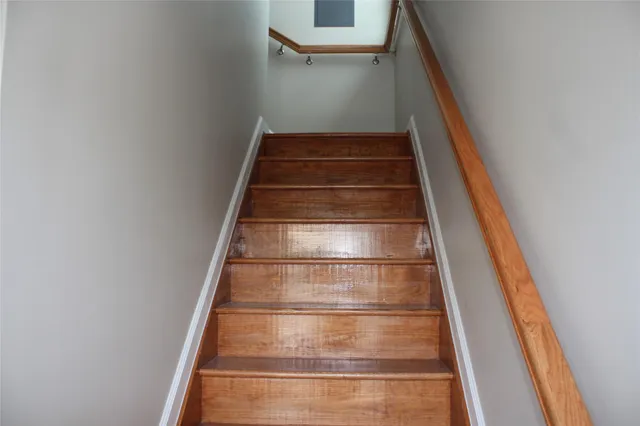 a kitchen with stainless steel appliances a refrigerator and a stove