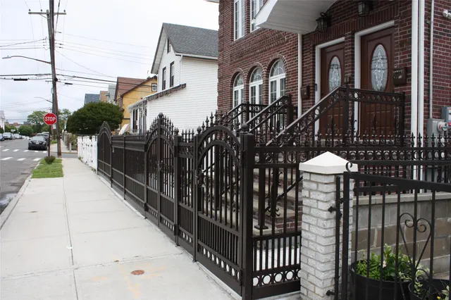 a front view of a house with parking space