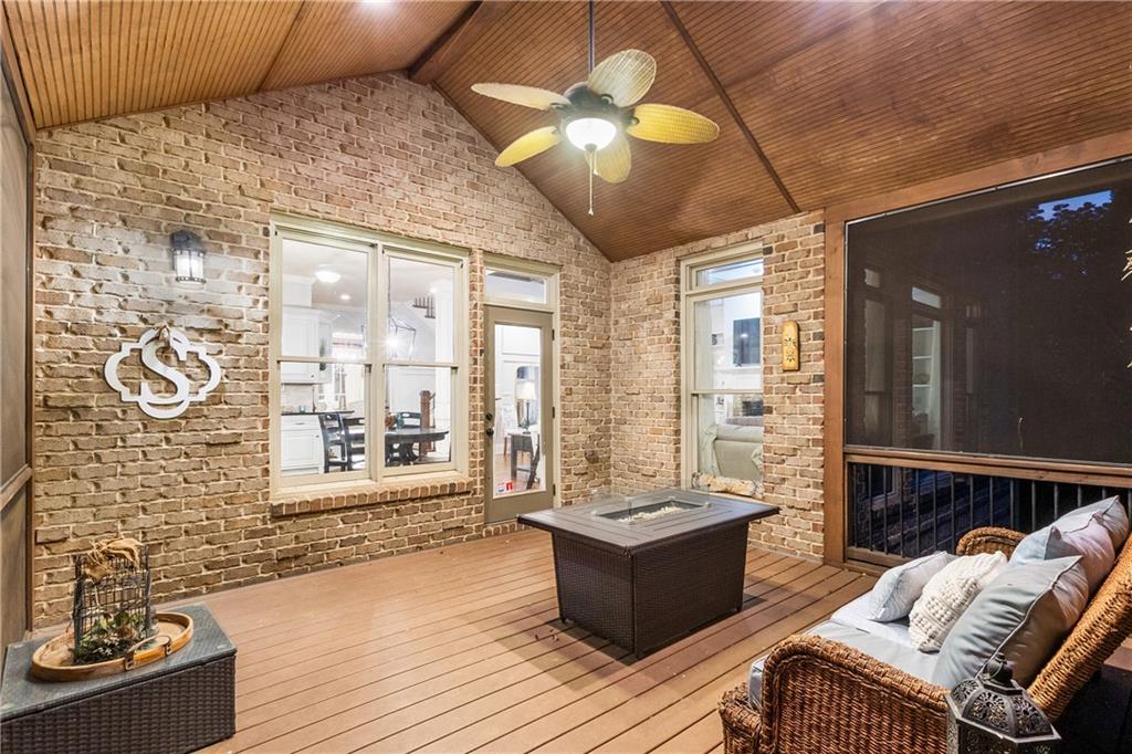 5605 Copper Creek Pass Cumming, GA 30040 - Photo 27 of 64 a living room with furniture and wooden floor