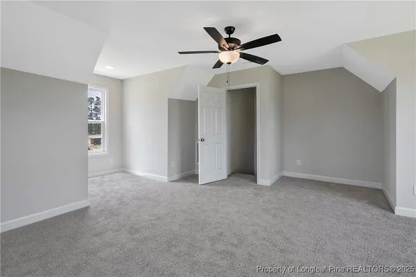 a view of empty room with windows