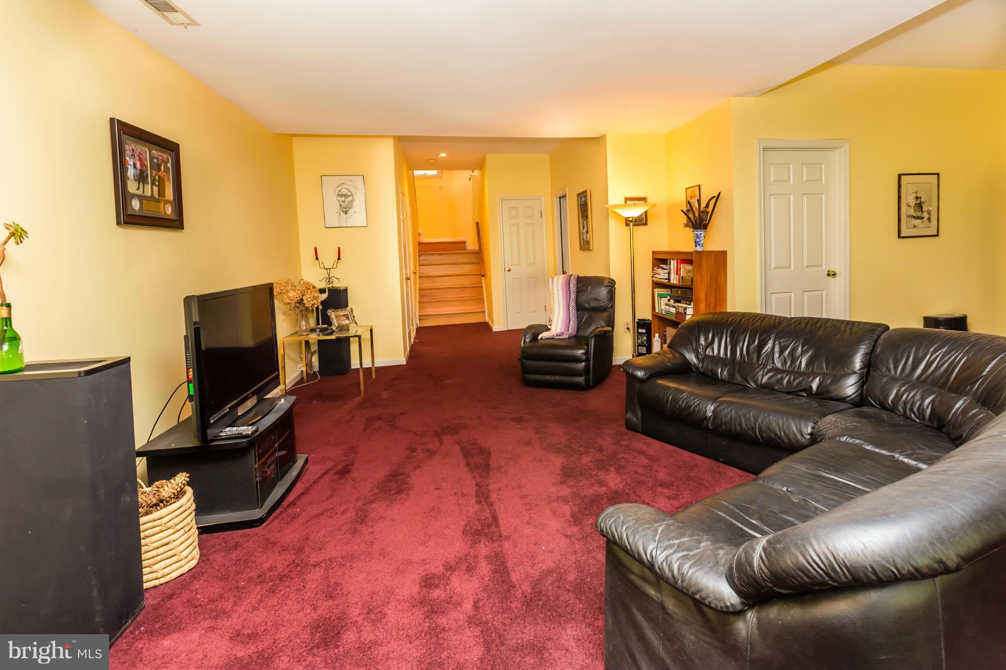 5117 Columbia Road, Unit 1427 Columbia, MD 21044 - Photo 23 of 30 Large lower level family room with fireplace