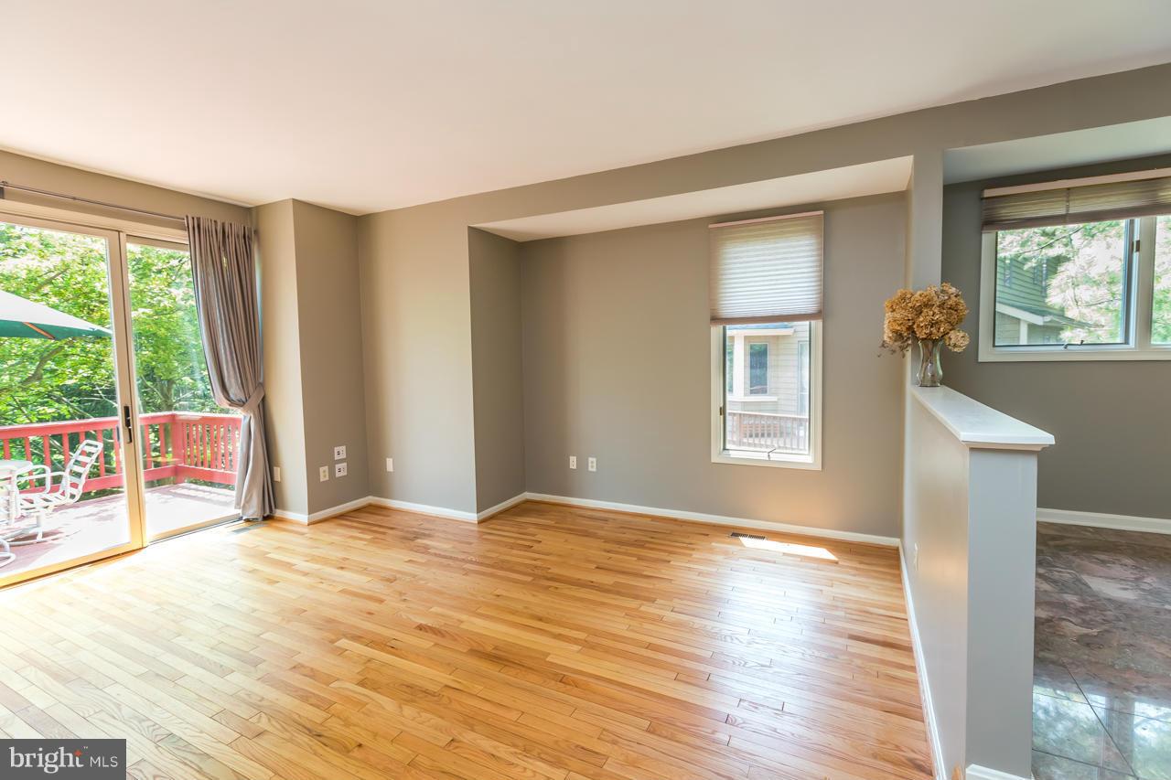 5117 Columbia Road, Unit 1427 Columbia, MD 21044 - Photo 6 of 30 Living Room with beautiful hardwood floors