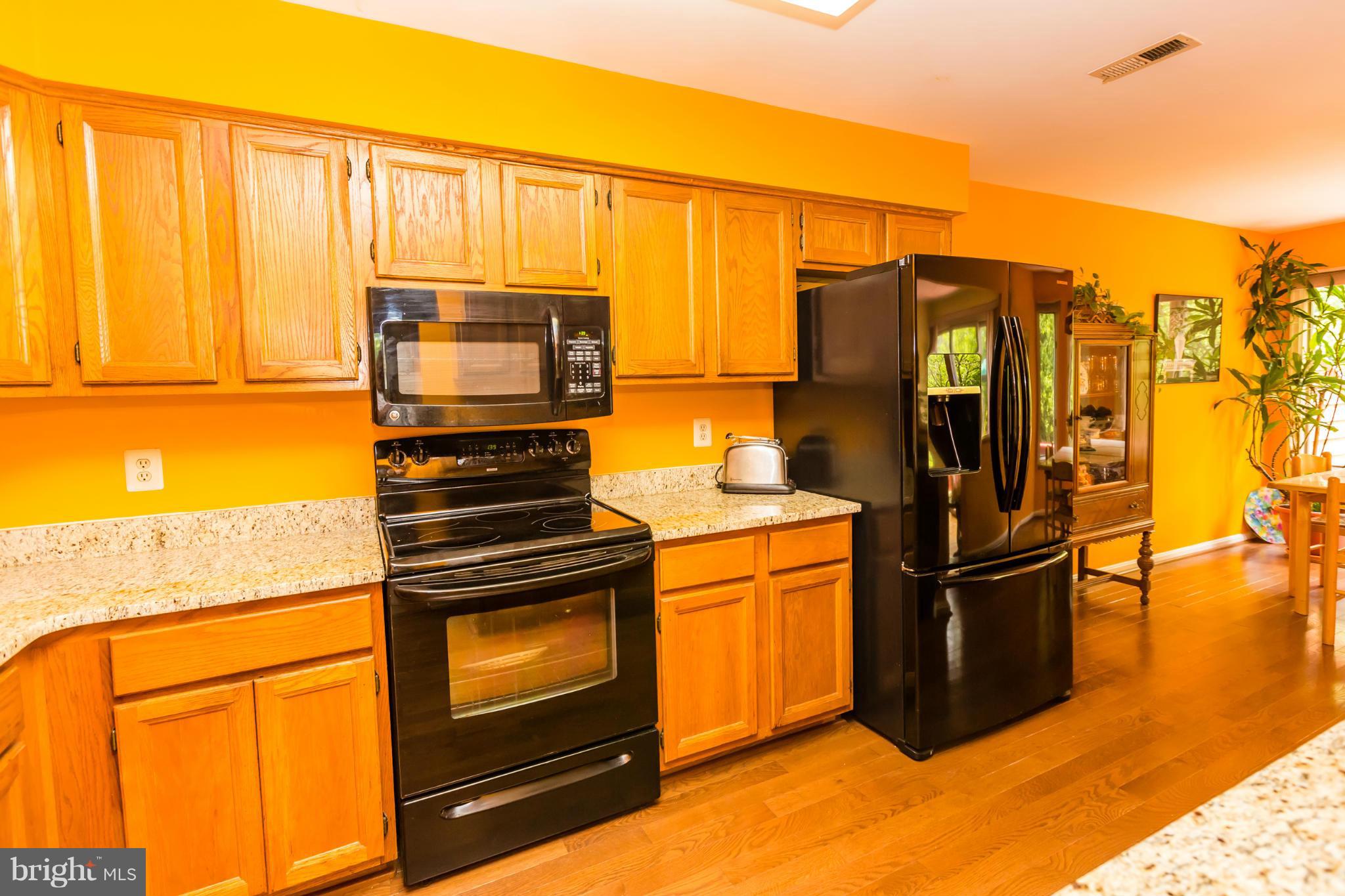 5117 Columbia Road, Unit 1427 Columbia, MD 21044 - Photo 8 of 30 Kitchen with granite and newer appliances