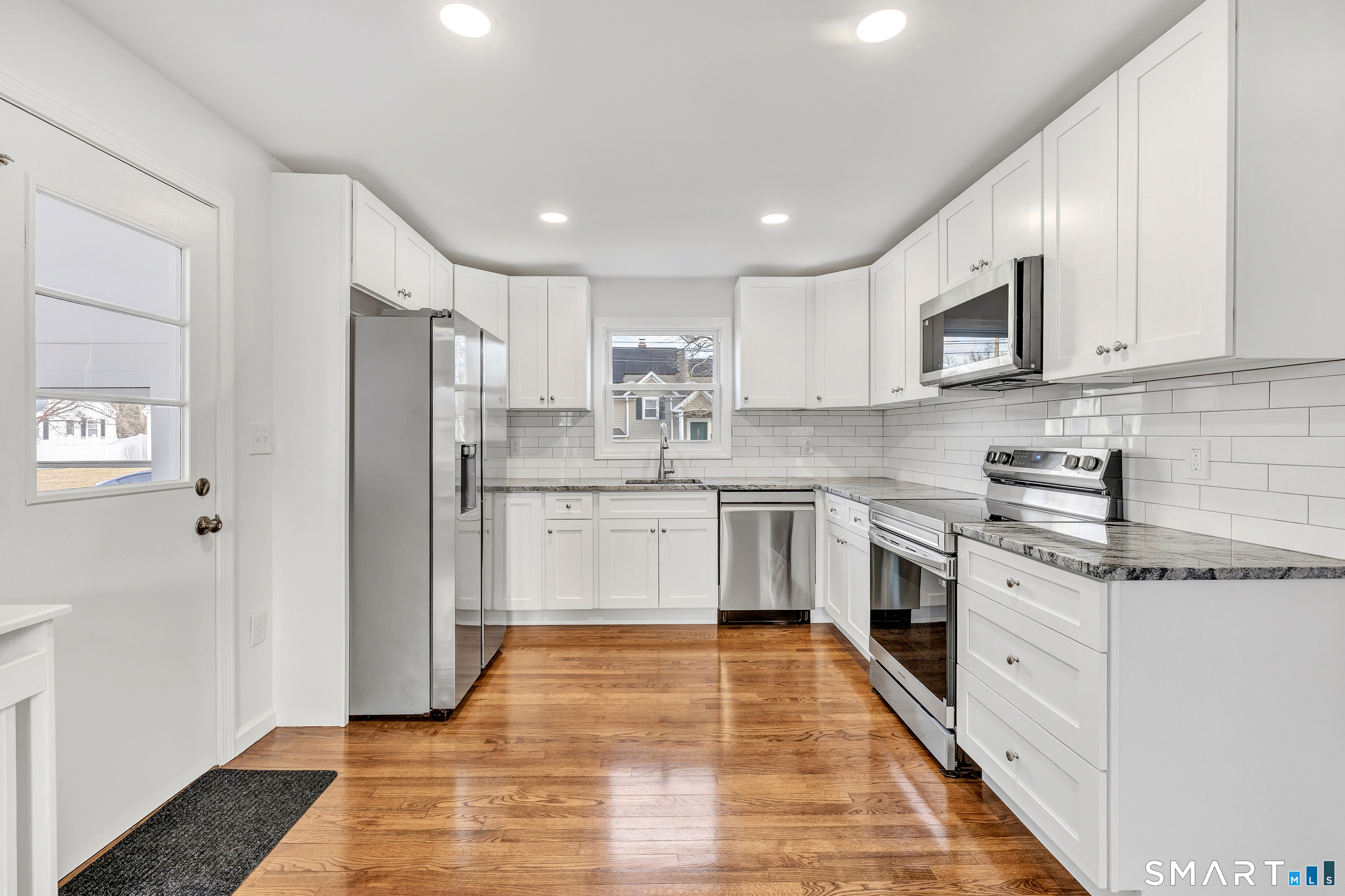 140 Shawmut Avenue North Haven, CT 06473 - Photo 9 of 39 Fully remodeled kitchen, complete with brand new stainless steel appliances.