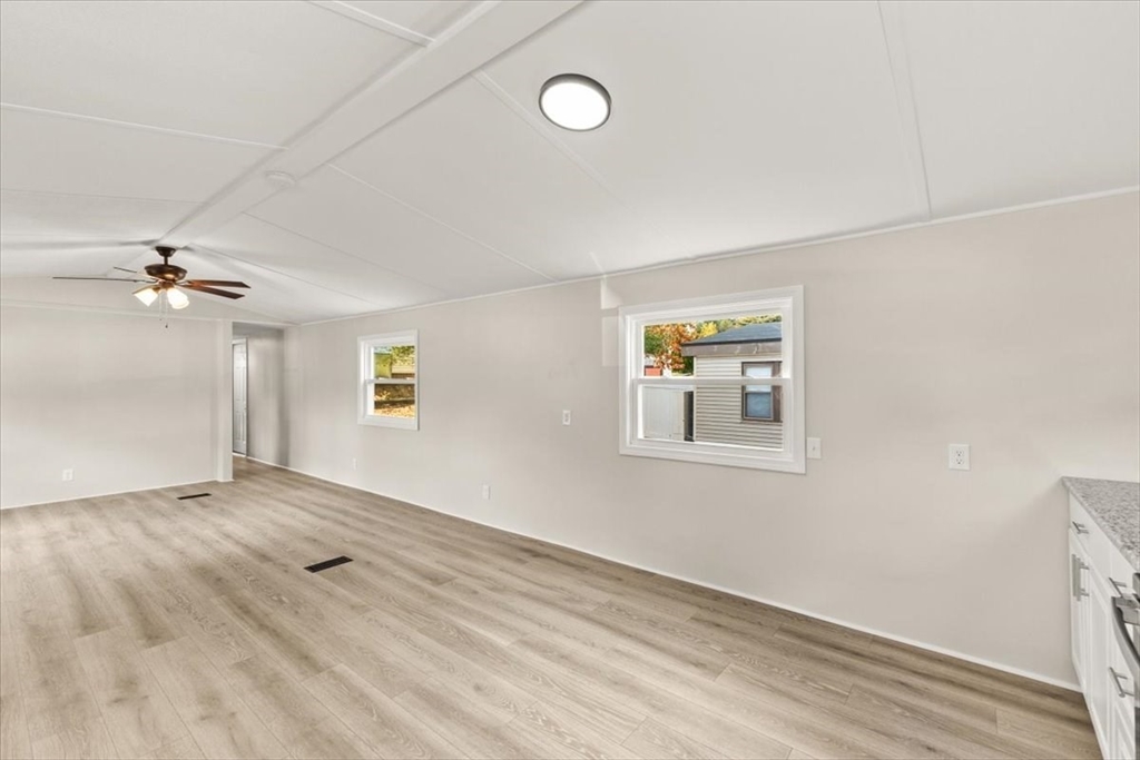 5 Marks Way Carver, MA 02330 - Photo 10 of 23 wooden floor in an empty room with a window