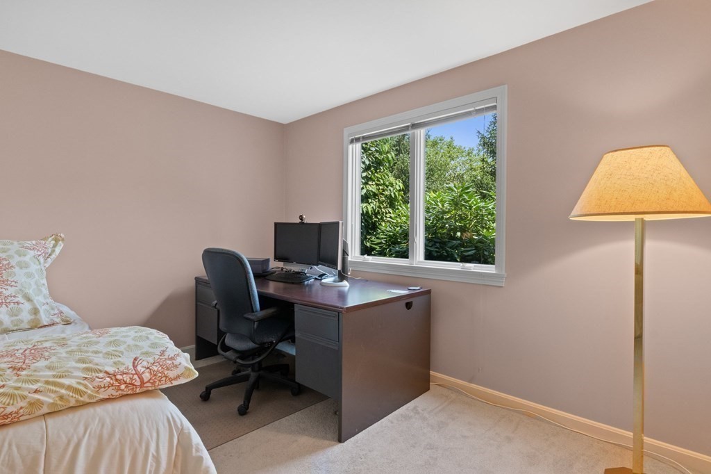 5 Woods Edge Lane, Unit 5 Mashpee, MA 02649 - Photo 13 of 29 a view of a workspace with furniture and a window