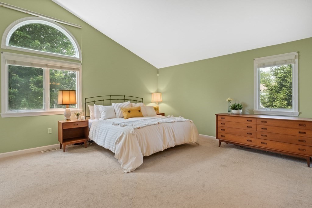 5 Woods Edge Lane, Unit 5 Mashpee, MA 02649 - Photo 14 of 29 a bed room with a bed and a window