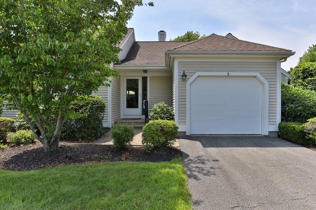 5 Woods Edge Lane, Unit 5 Mashpee, MA 02649 - Photo 2 of 29 front view of a house with a yard