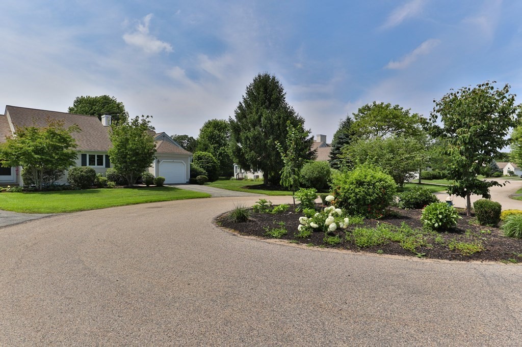 5 Woods Edge Lane, Unit 5 Mashpee, MA 02649 - Photo 21 of 29 a view of outdoor space yard and entertaining space