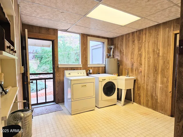 a utility room with dryer and washer