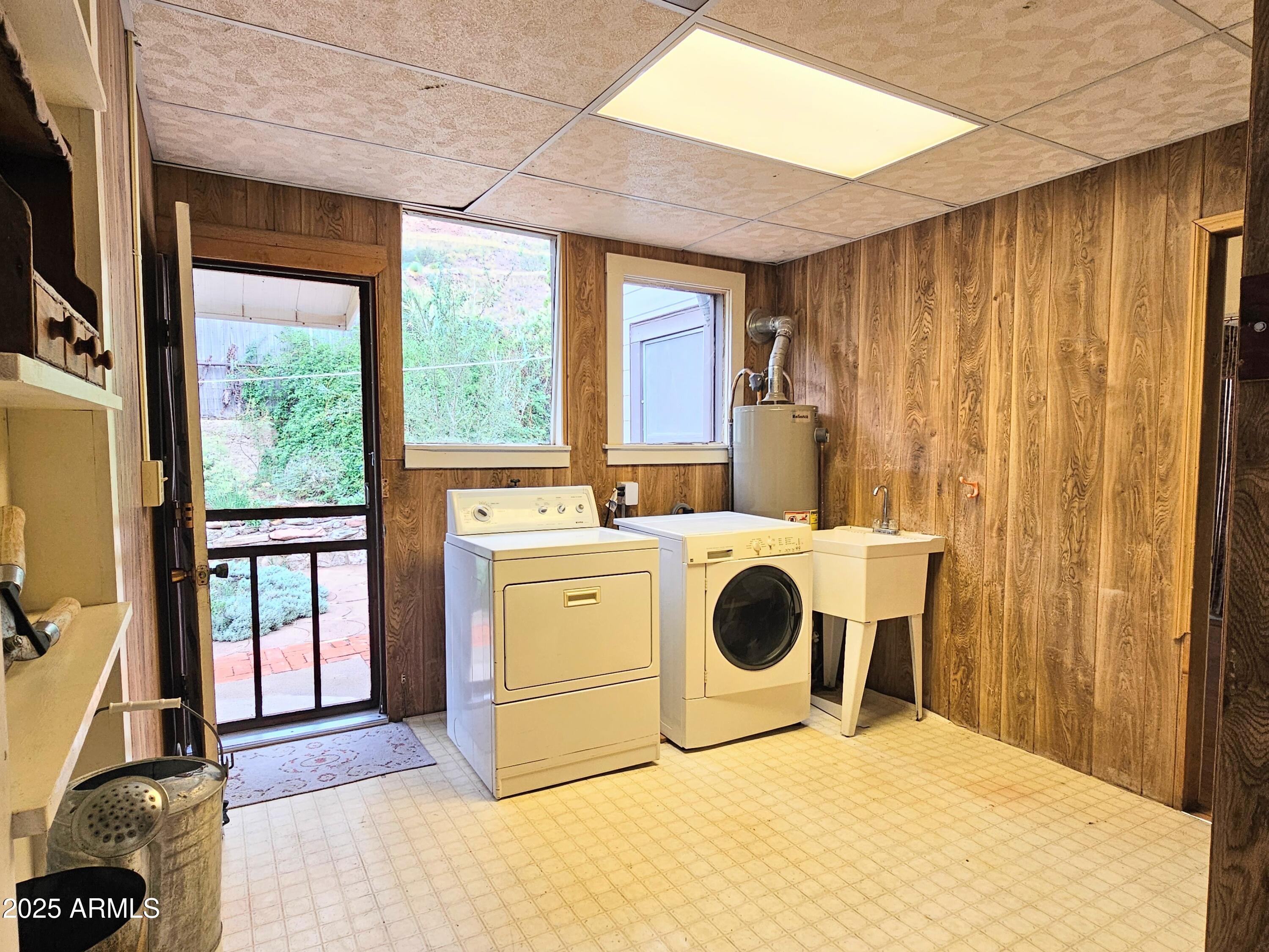 164 Quality Hill Road Bisbee, AZ 85603 - Photo 25 of 36 a utility room with dryer and washer