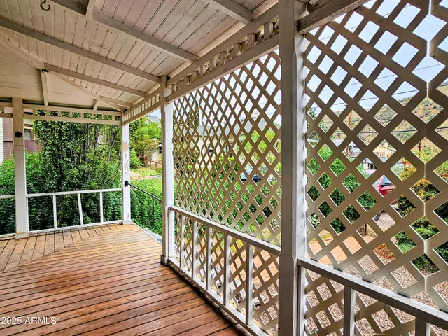 a view of a house with a yard and plant