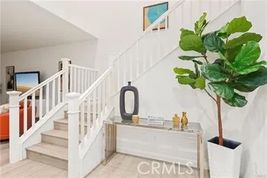 a view of entryway with flower pots
