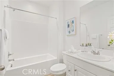 a bathroom with a sink a toilet and a bathtub