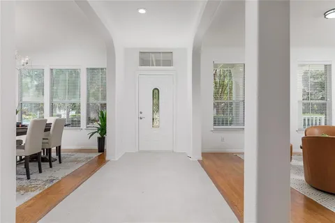 a view of a livingroom with a dining table and a couch