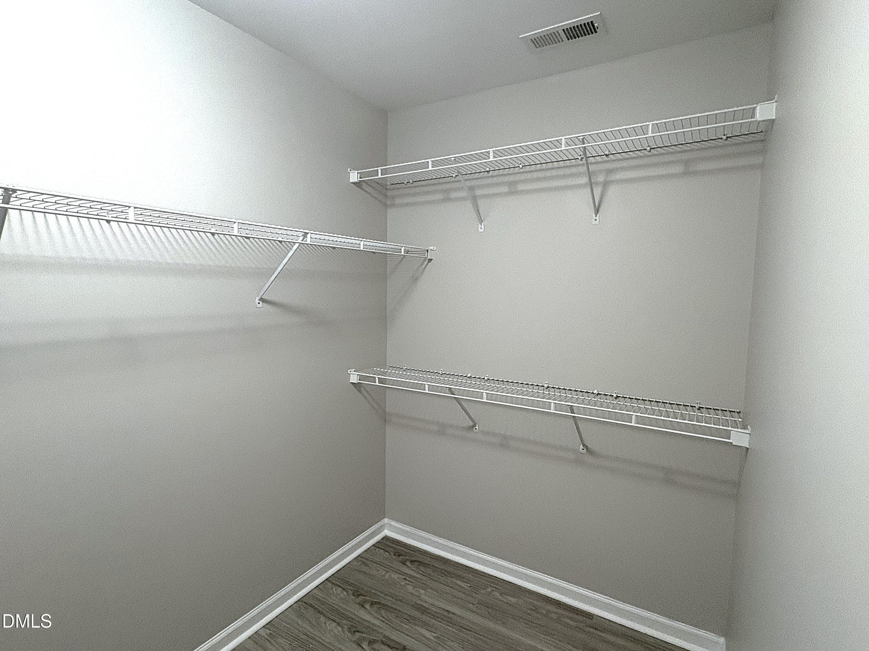 115 Chancellors Ridge Drive Durham, NC 27713 - Photo 27 of 57 a view of a room with racks on the wall