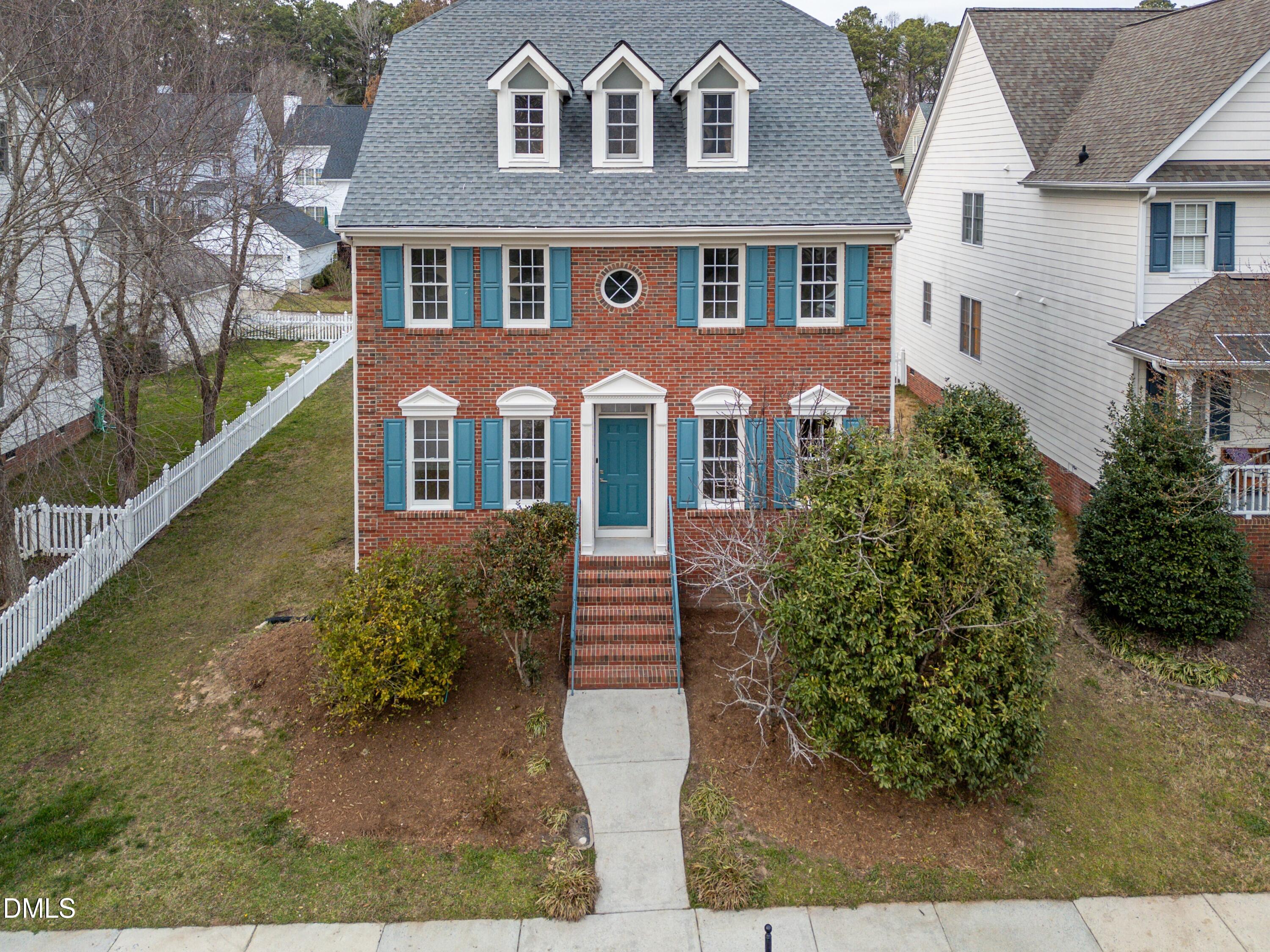 115 Chancellors Ridge Drive Durham, NC 27713 - Photo 36 of 57 front view of a house with a yard