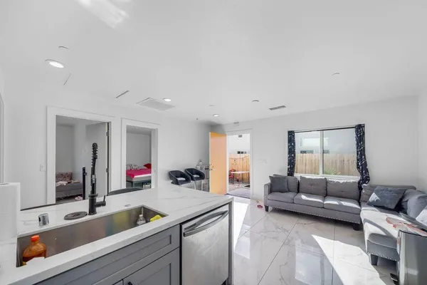 a living room with furniture and a couch