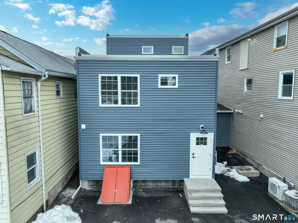 a front view of a house with a garage