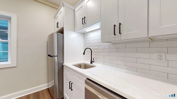 a close view of a sink and a vanity in the bathroom