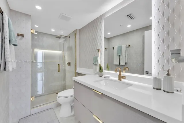 a spacious bedroom with a bed and a large window