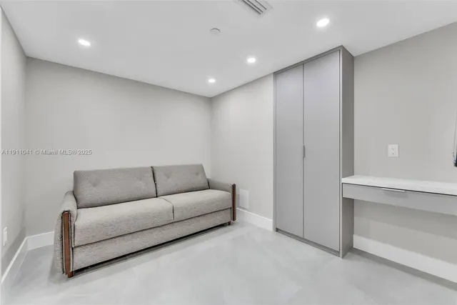 a outdoor space with lots of potted plants