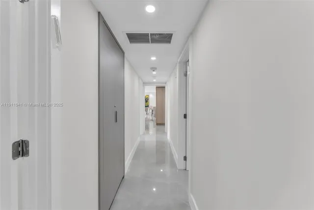 a view of a swimming pool with outdoor seating